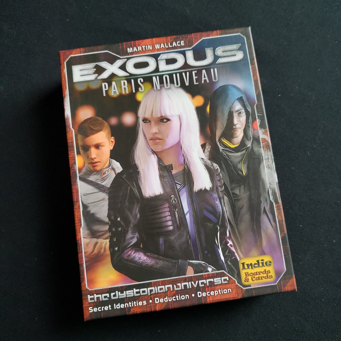 Image shows the front cover of the box of the Exodus: Paris Nouveau card game