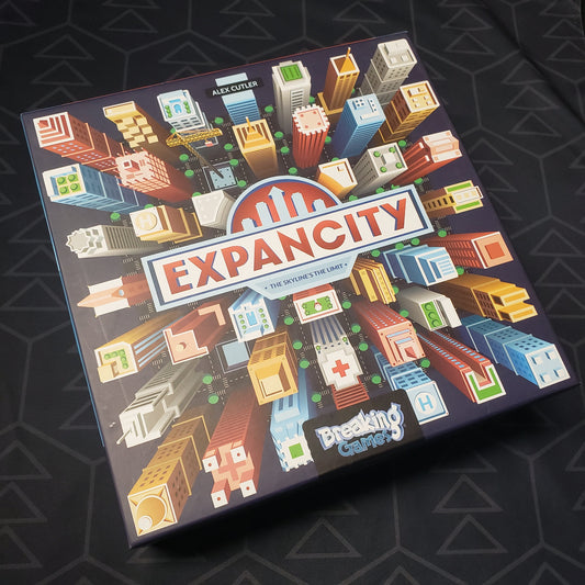 Image shows the front cover of the box for the Expancity board game
