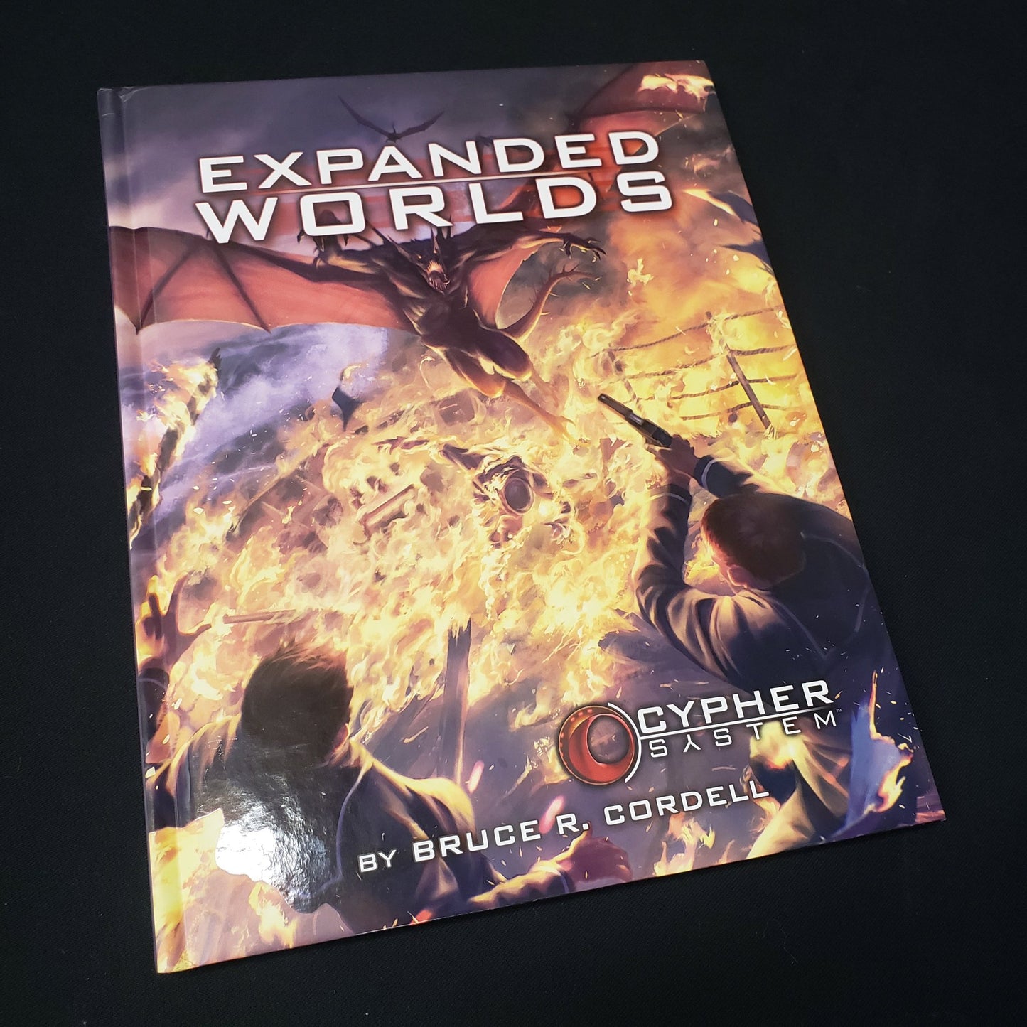 Image shows the front cover of the Expanded Worlds roleplaying game book