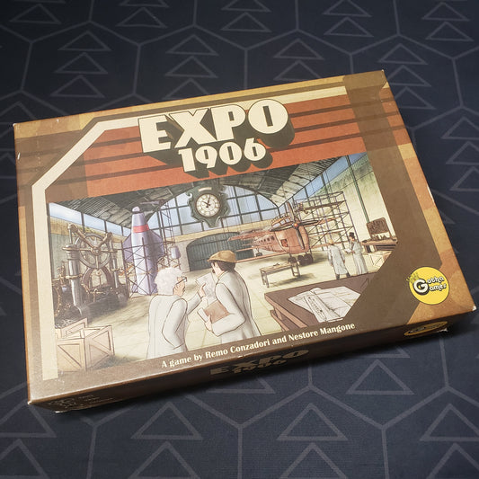 Image shows the front cover of the box for the Expo 1906 board game