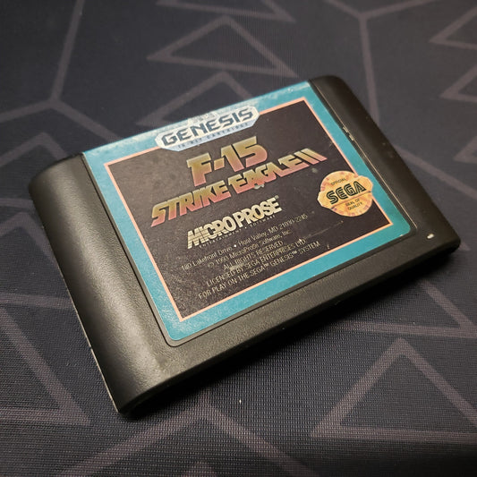 Image shows the front of the cartridge for the video game F-15 Strike Eagle II for Sega Genesis