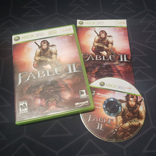 Image shows the case, manual and disc for the video game Fable II for Xbox 360