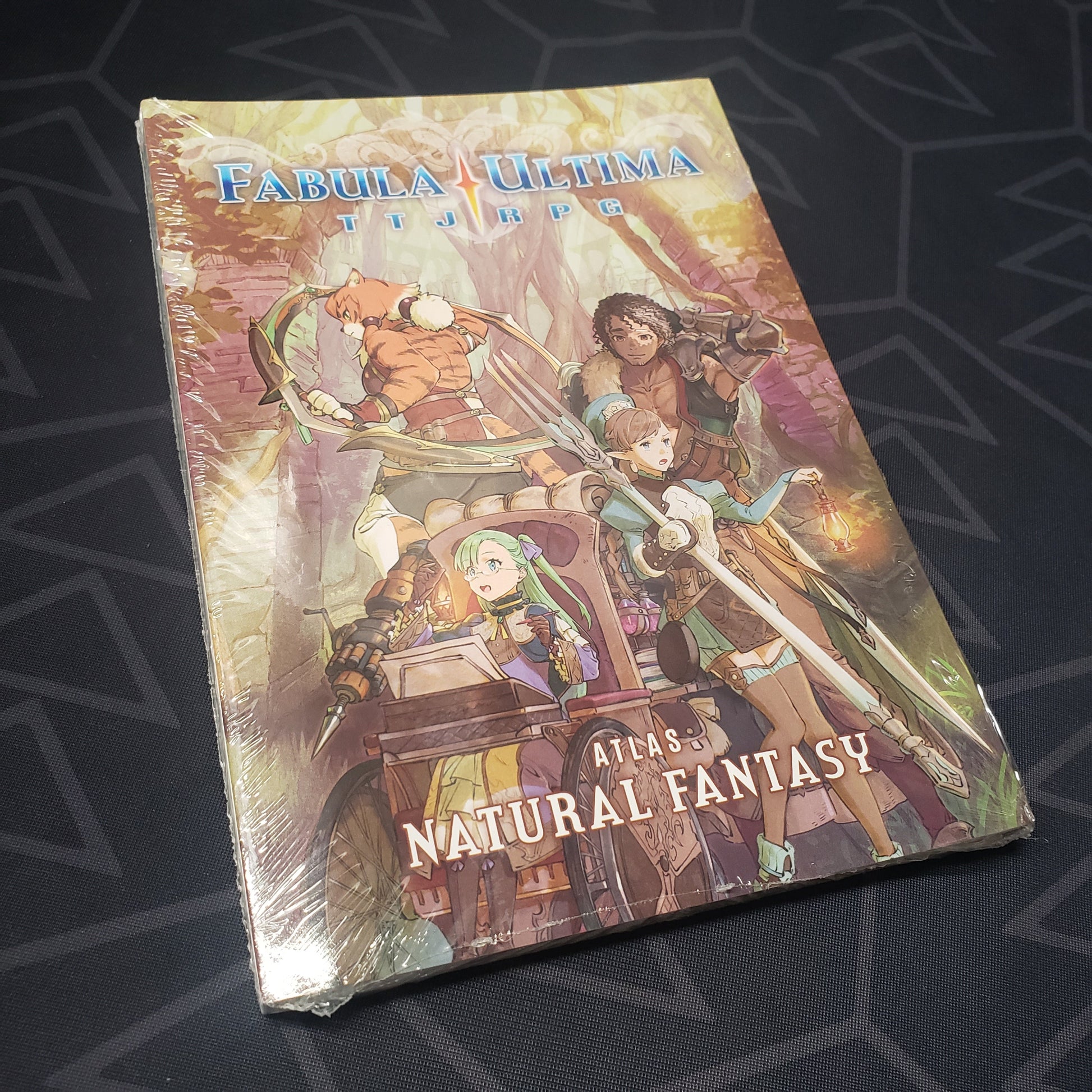 Image shows the front cover of the Natural Fantasy Atlas book for the roleplaying game Fabula Ultima