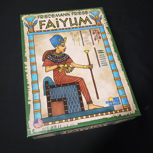 Image shows the front cover of the box of the Faiyum board game