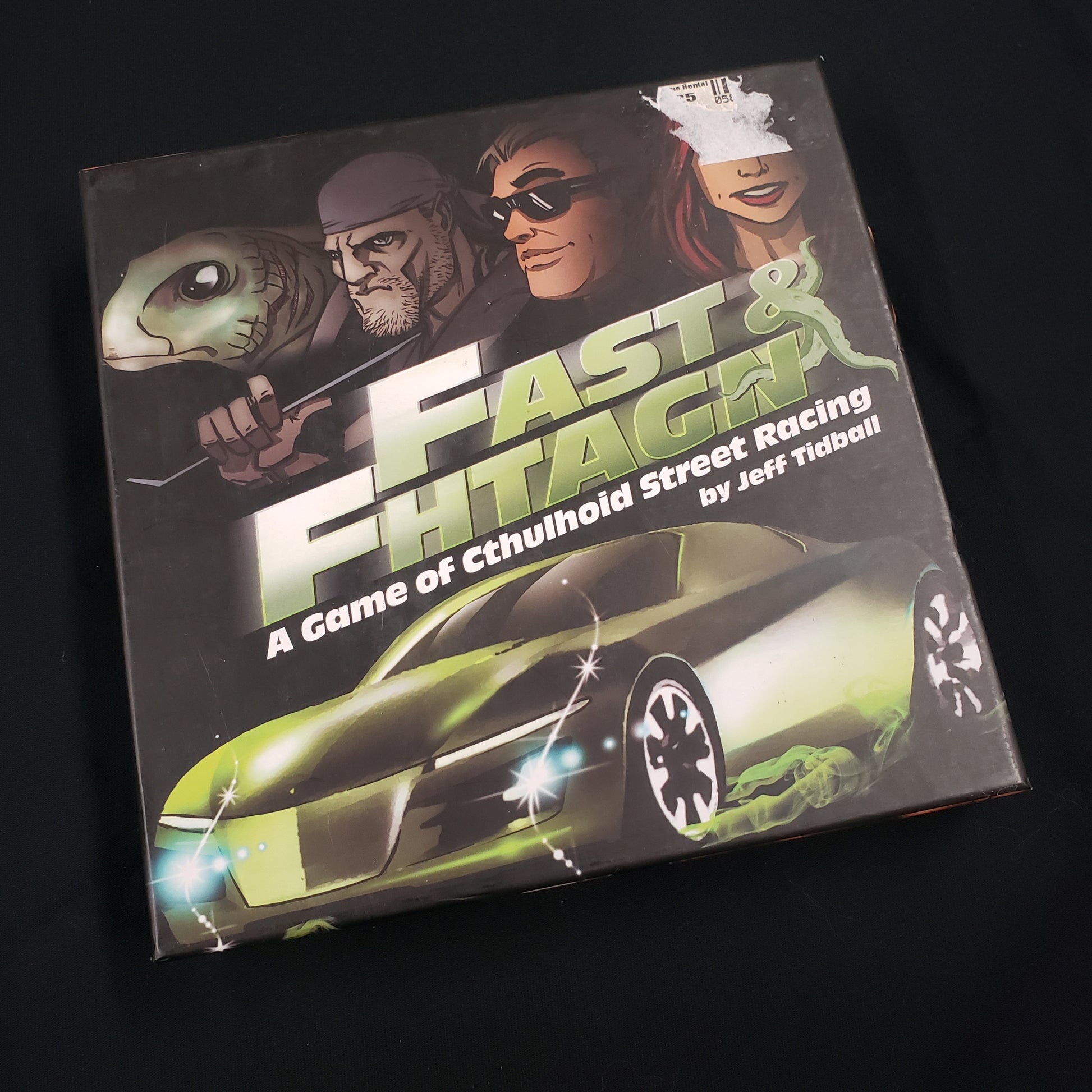 Image shows the front cover of the box of the Fast & Fhtagn card game