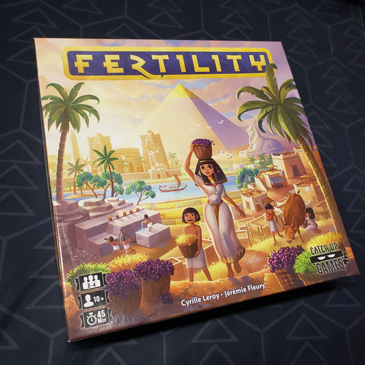Image shows the front cover of the box for the Fertility board game