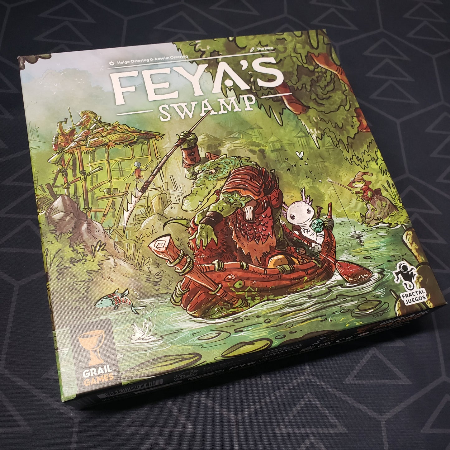 Image shows the front cover of the box for the Feya's Swamp board game