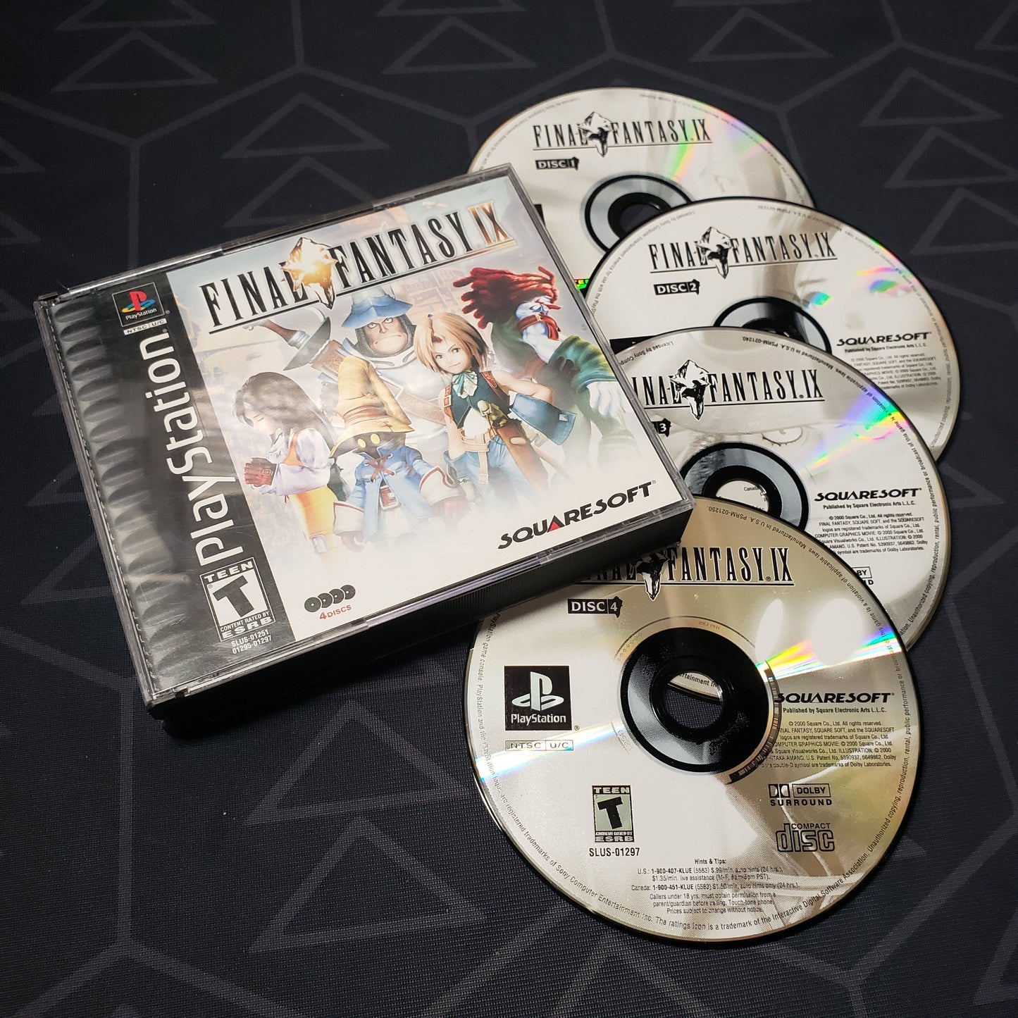 Image shows the jewel case and four discs for the video game Final Fantasy IX for Playstation 1