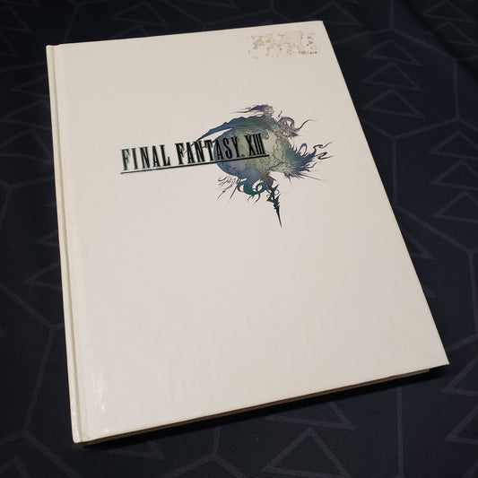 Image shows the front cover of the Final Fantasy XIII: The Complete Official Strategy Guide book