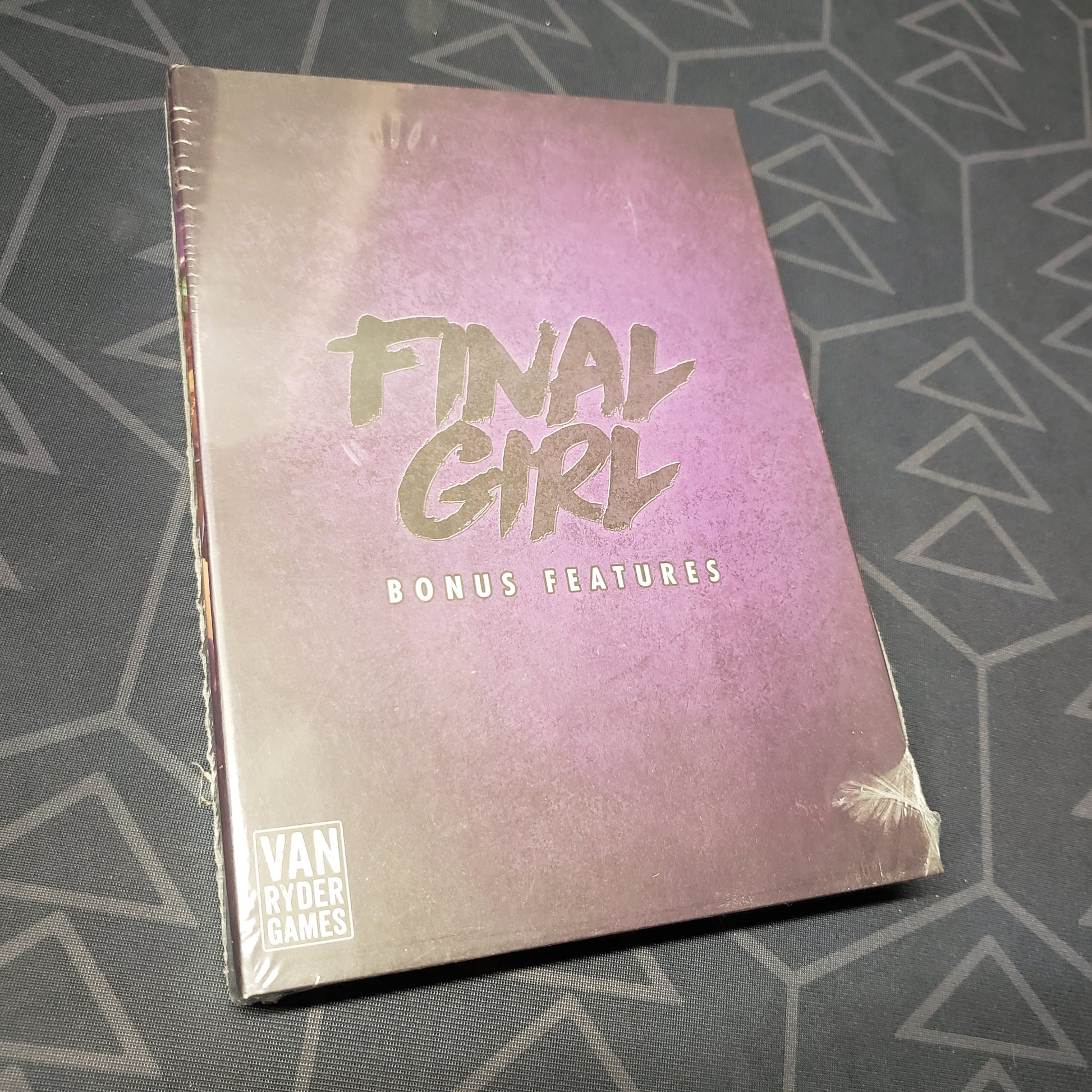 Image shows the front cover of the box of the Series 1 Bonus Features expansion for the board game Final Girl