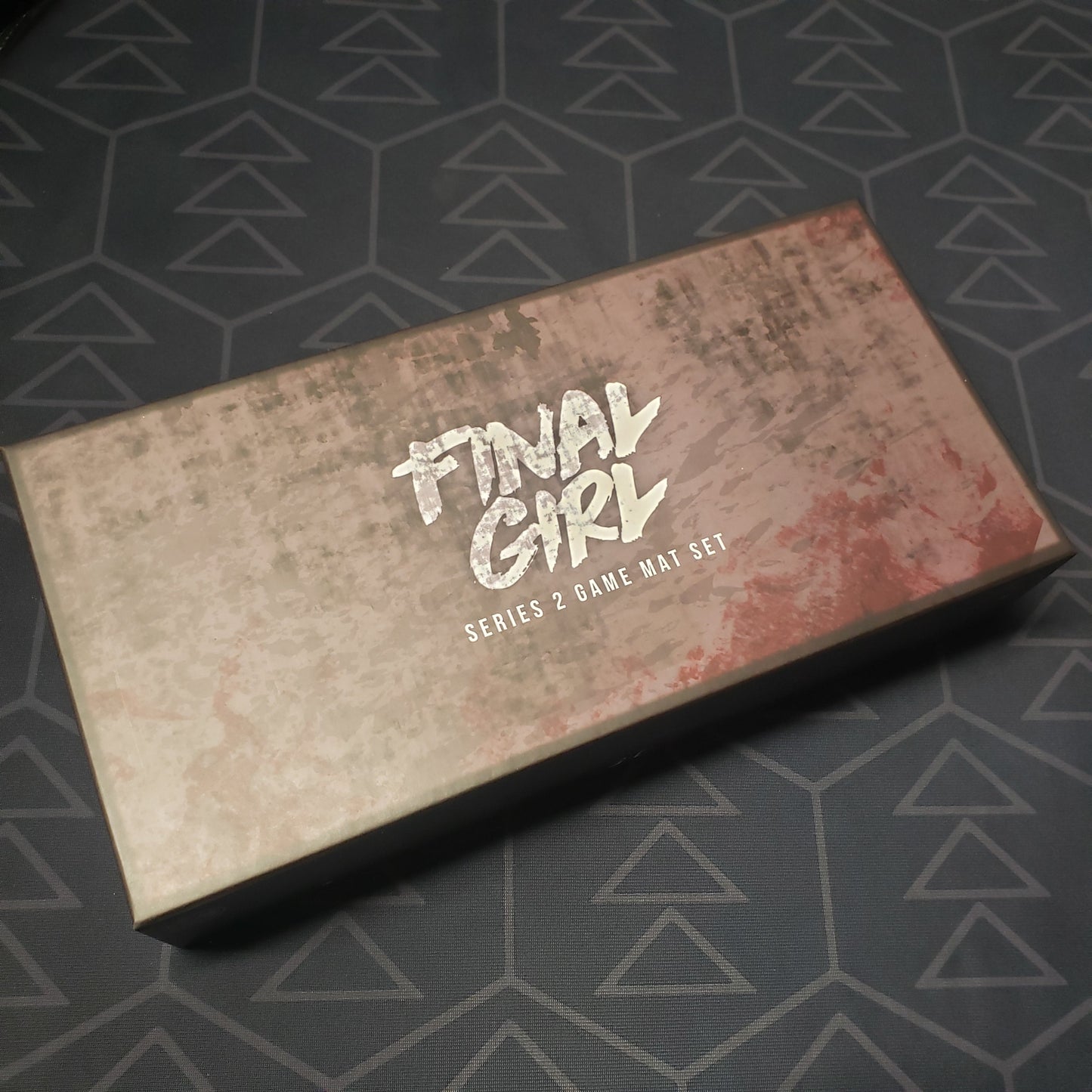 Image shows the front cover of the box of the Series 2 Game Mat Set for the board game Final Girl