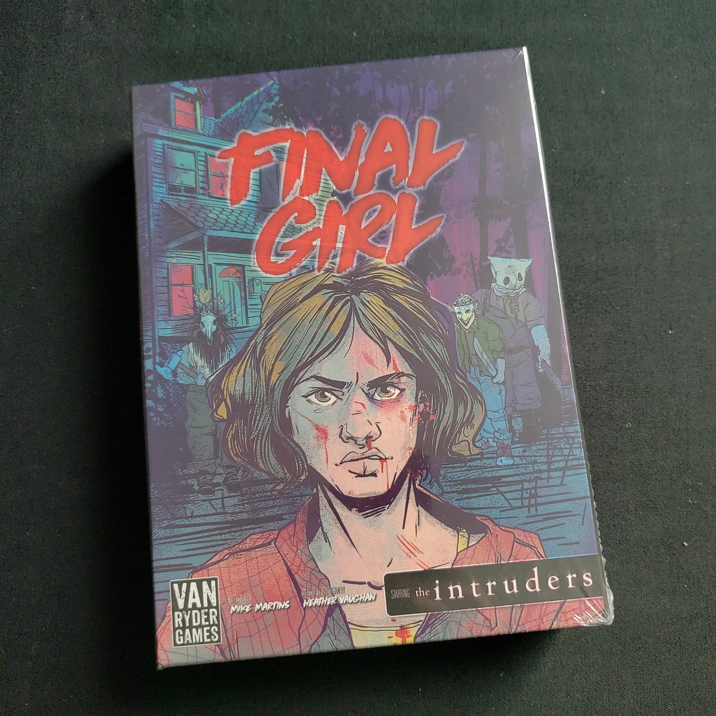 Image shows the front of the box for the Knock at the Door Feature Film Expansion for the Final Girl board game