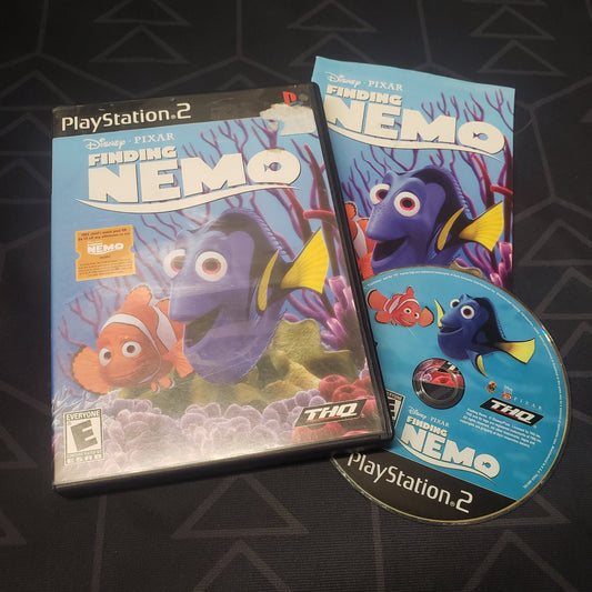Image shows the case, manual and disc for the video game Finding Nemo for Playstation 2
