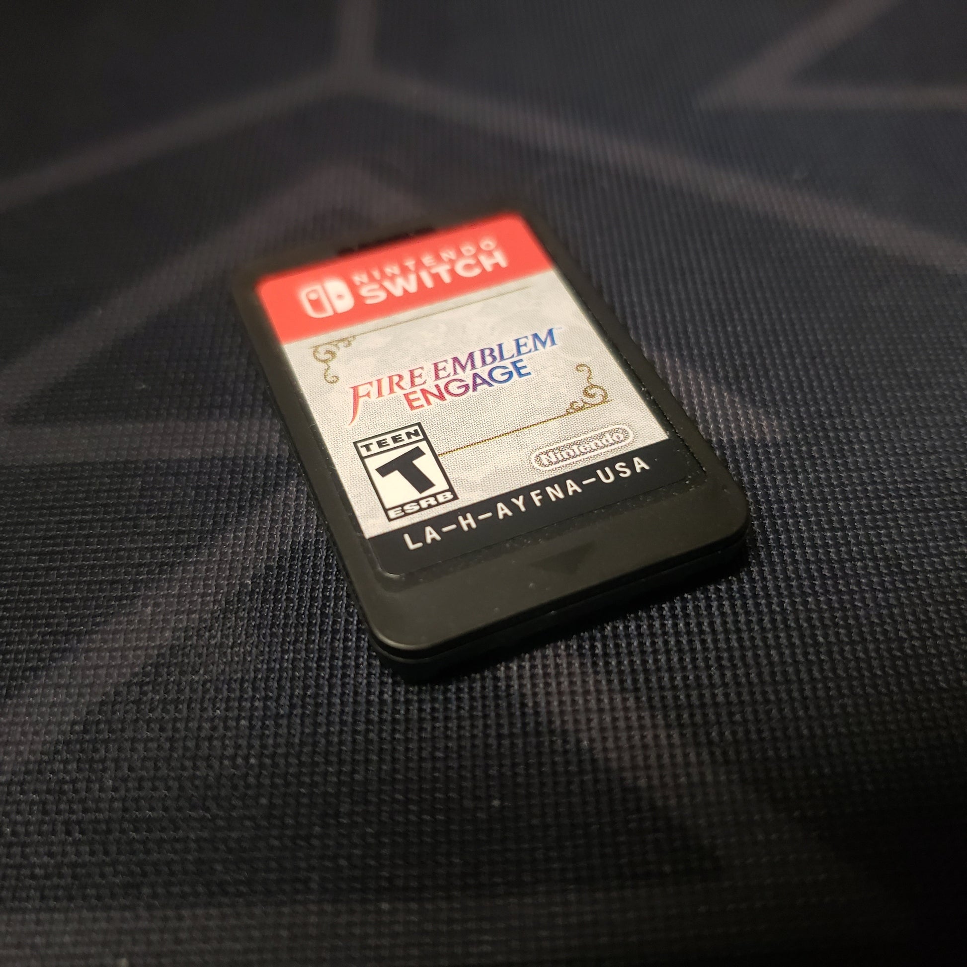 Image shows the game cartridge for the video game Fire Emblem: Engage for Nintendo Switch