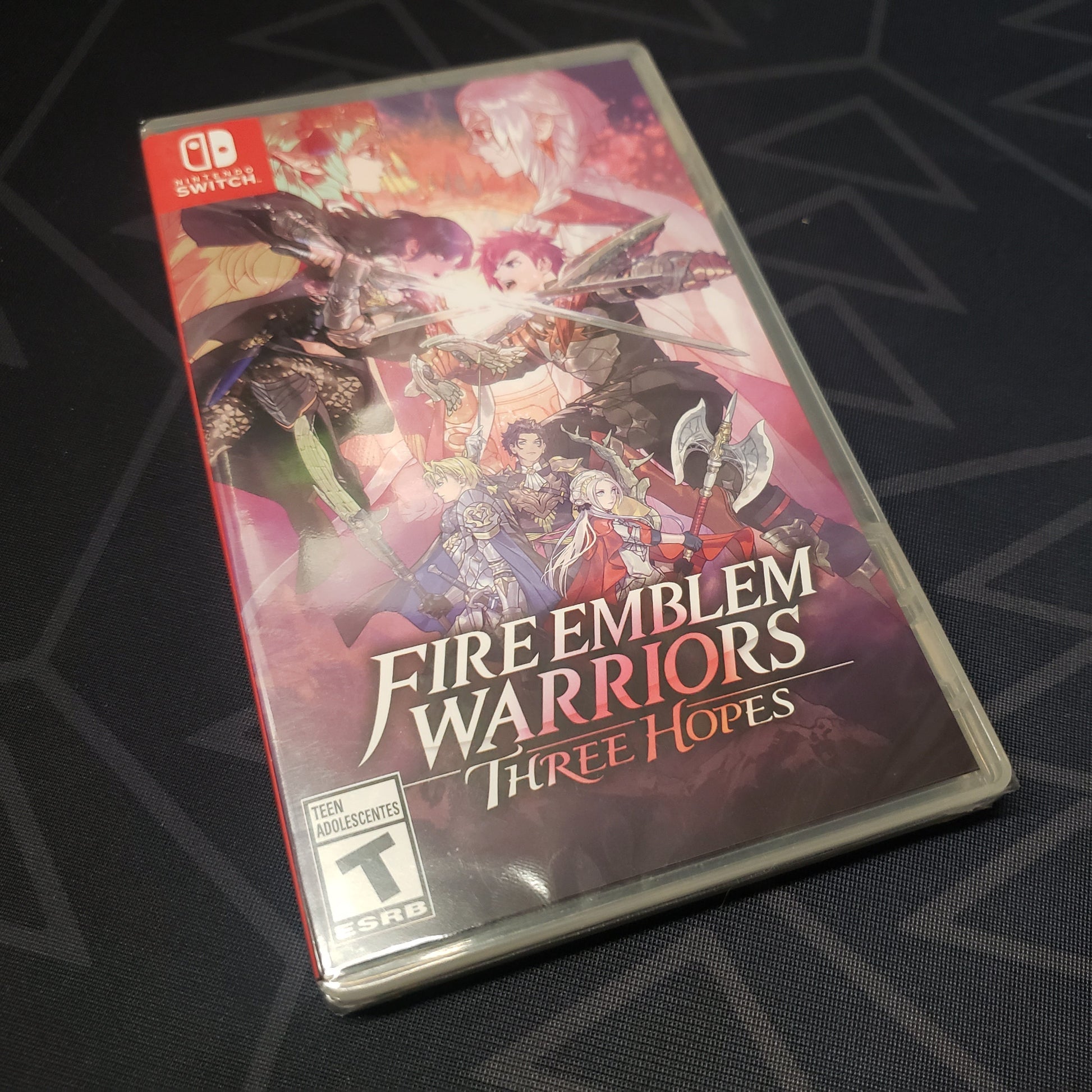 Image shows the front of the case for the video game Fire Emblem Warriors: Three Hopes for Nintendo Switch