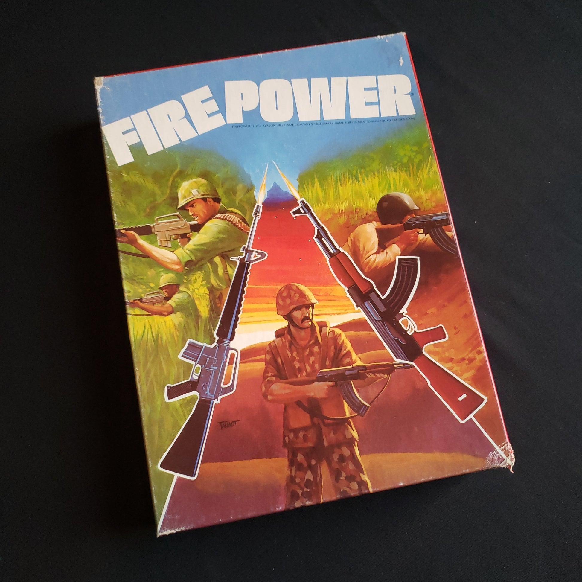 Image shows the front cover of the box of the Firepower board game