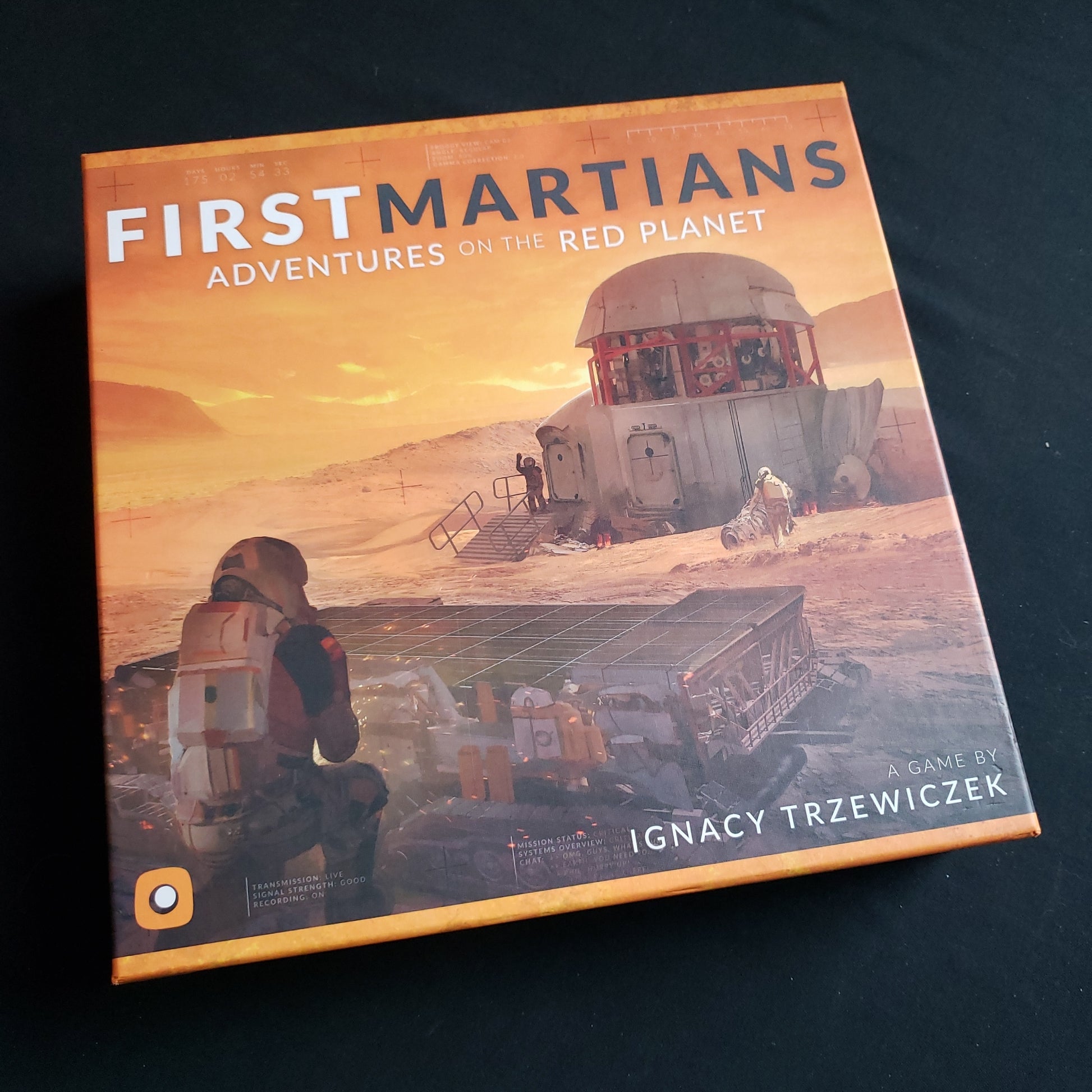 Image shows the front cover of the box of the First Martians board game