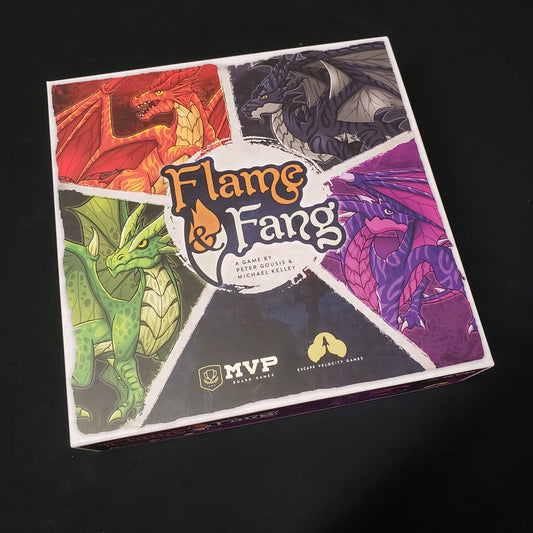 Image shows the front cover of the box of the Flame & Fang board game