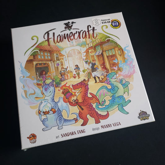 Image shows the front cover of the box of the Flamecraft board game