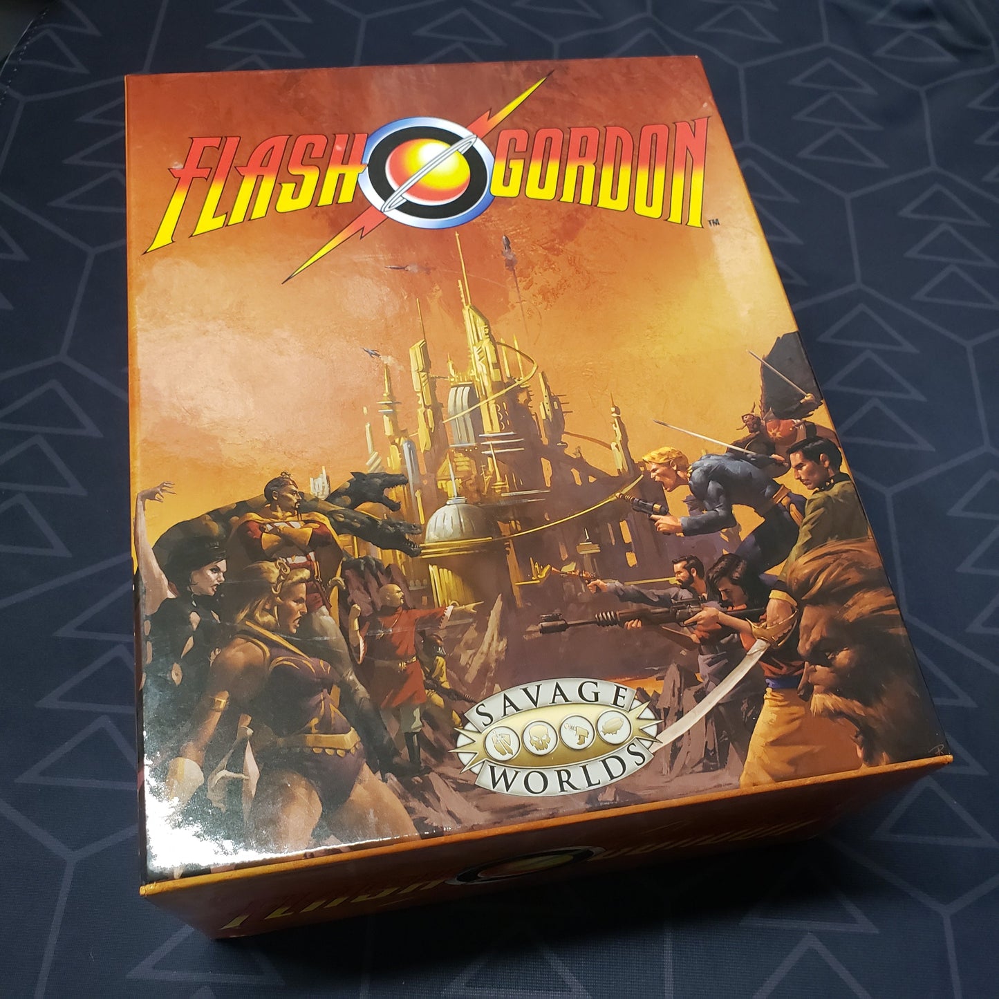 Image shows the front cover of the Limited Edition Collector's Box Set for the roleplaying game Flash Gordon