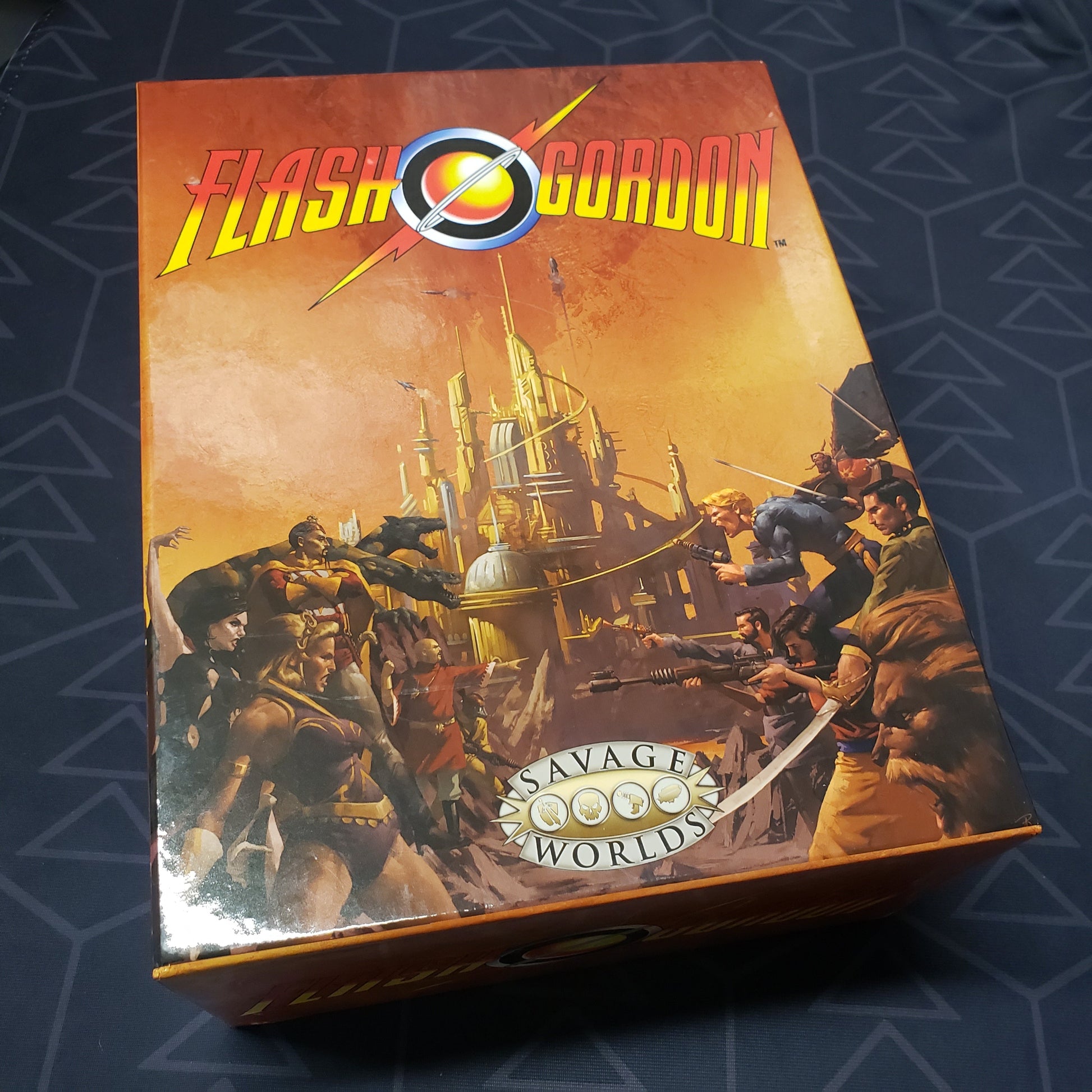 Image shows the front cover of the Limited Edition Collector's Box Set for the roleplaying game Flash Gordon