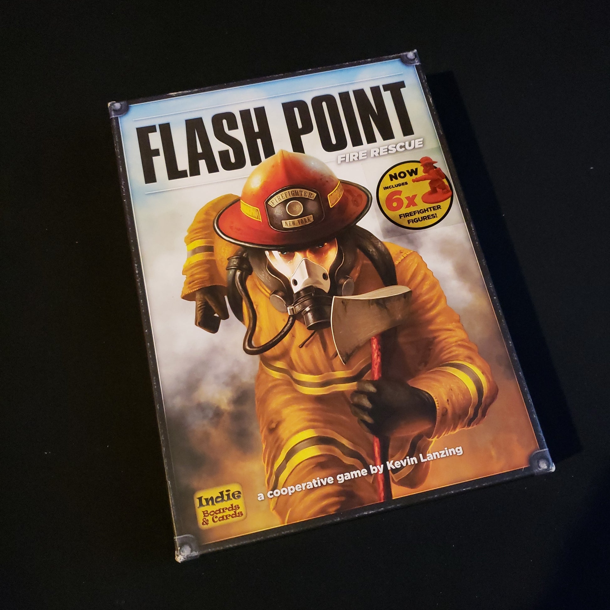 Image shows the front cover of the box of the Flash Point: Fire Rescue board game