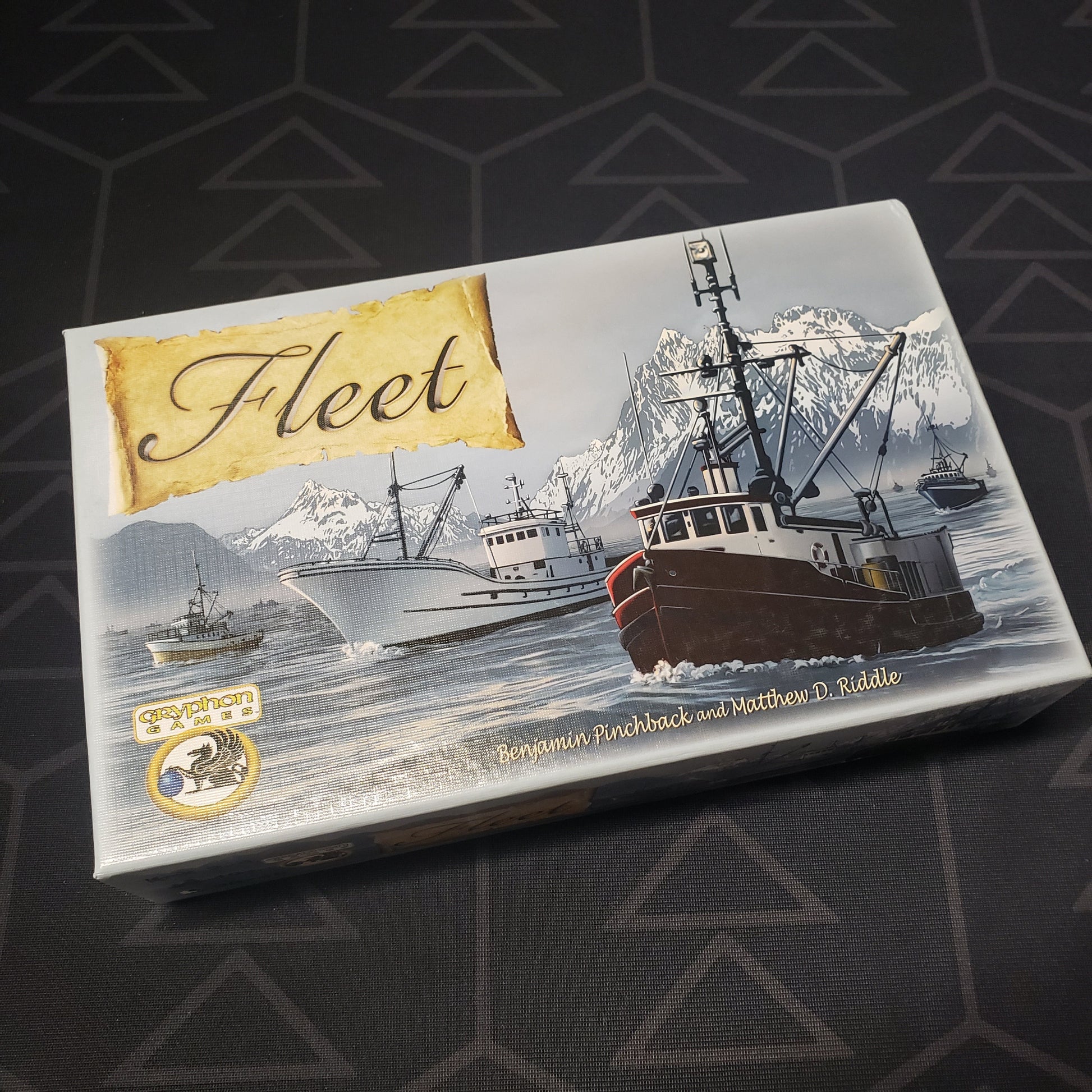 Image shows the front cover of the box for the Fleet card game