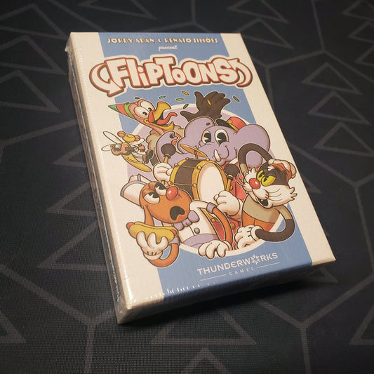 Image shows the front cover of the box for the FlipToons card game