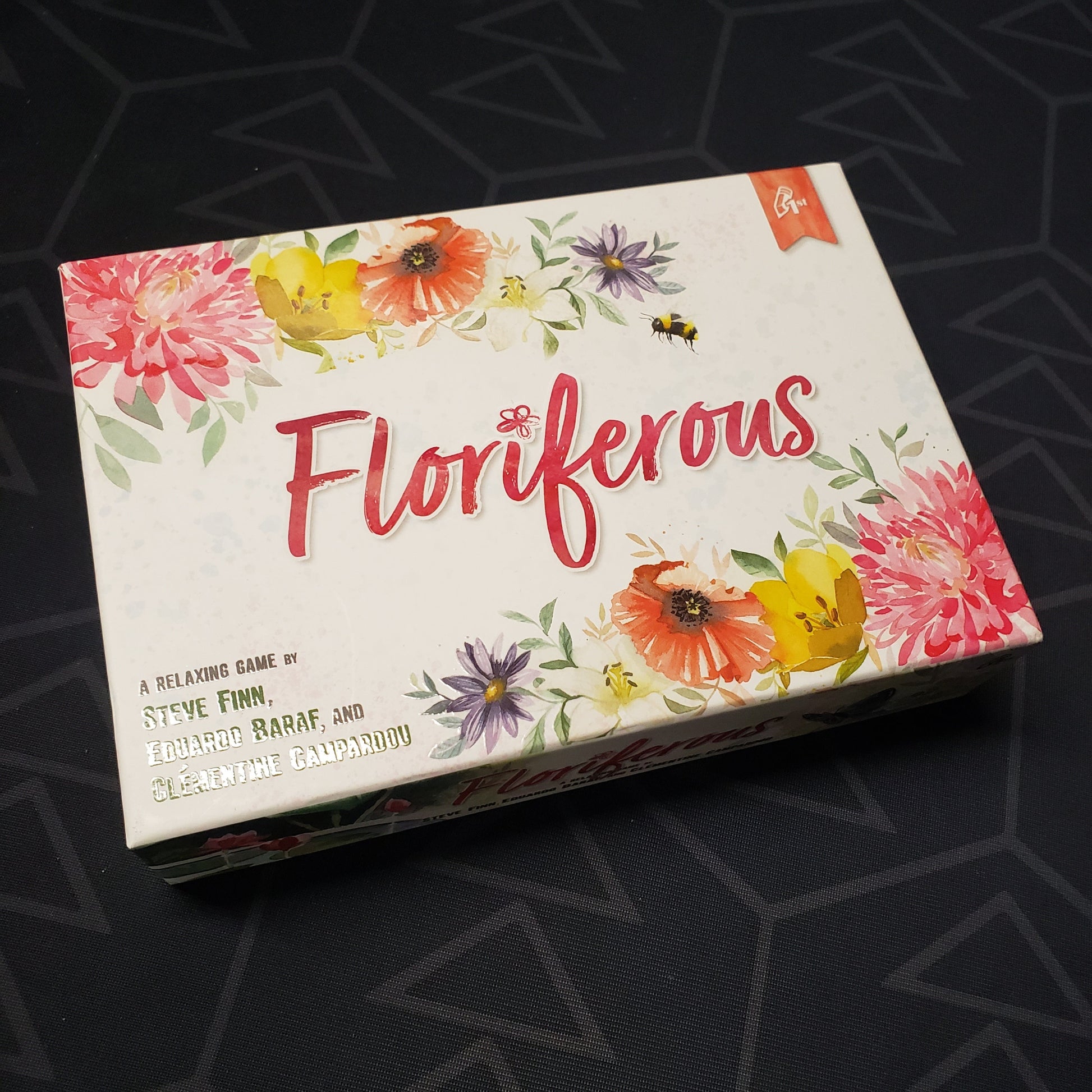 Image shows the front cover of the box for the Floriferous card game