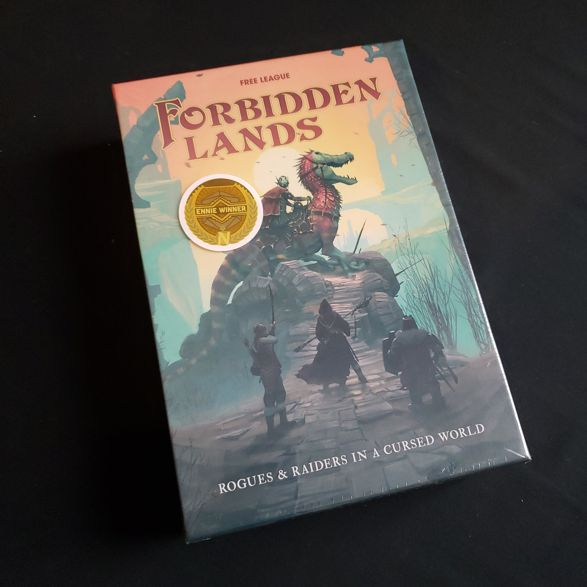 Image shows the front cover of the Core Set box for the Forbidden Lands roleplaying game