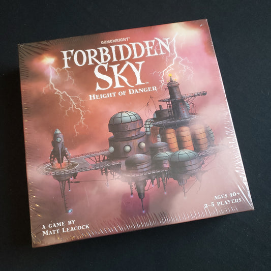 Image shows the front cover of the box of the Forbidden Sky board game