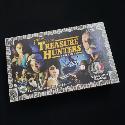 Image shows the front cover of the box of the Treasure Hunters expansion for the board game Fortune & Glory