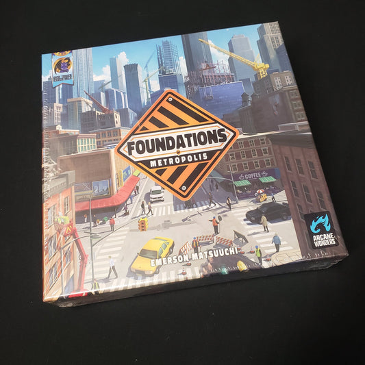 Image shows the front cover of the box of the Foundations of Metropolis board game