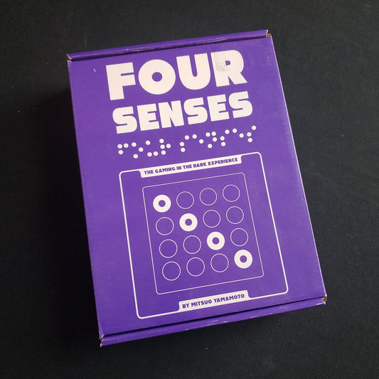 Image shows the front cover of the box of the Four Senses board game