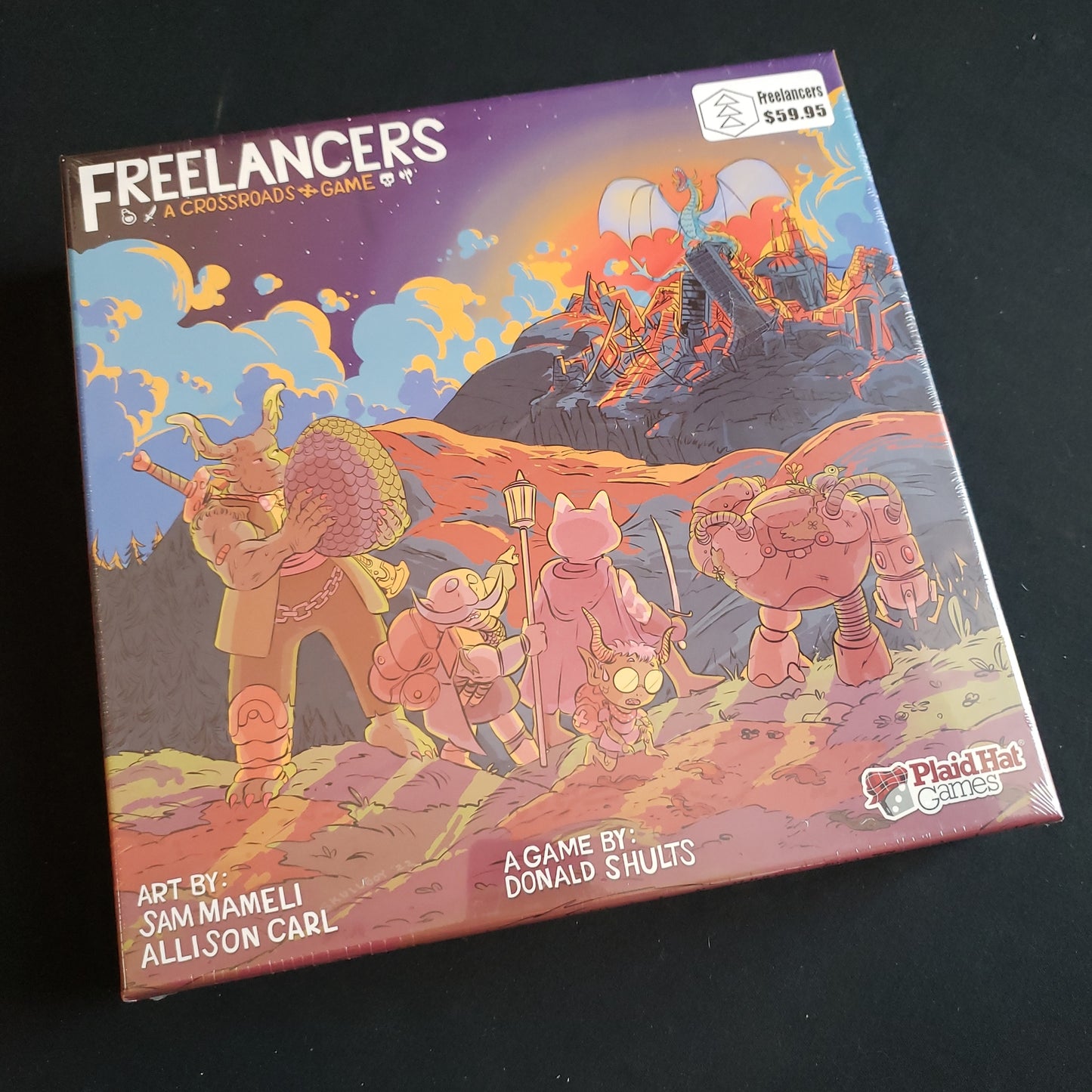 Image shows the front cover of the box of the Freelancers board game