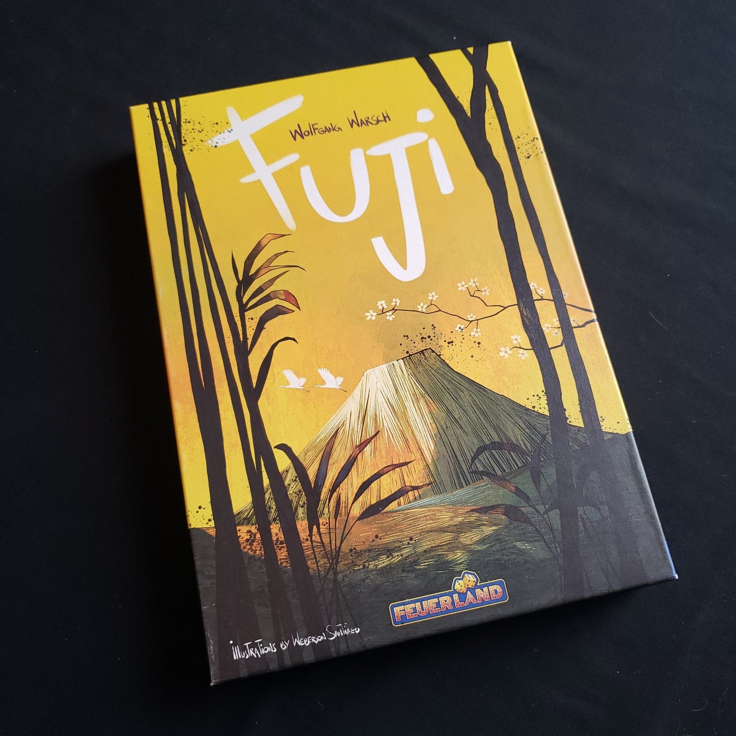 Image shows the front cover of the box of the Fuji board game