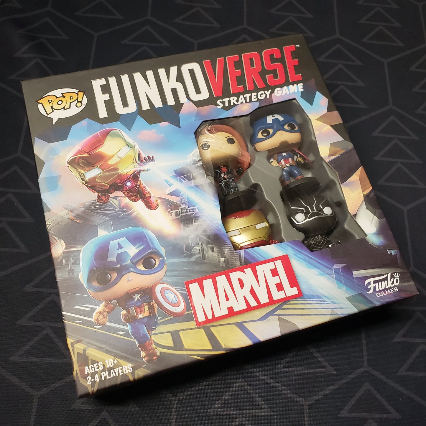 Image shows the front cover of the box for the Funkoverse Strategy Game: Marvel 100 4-Pack board game