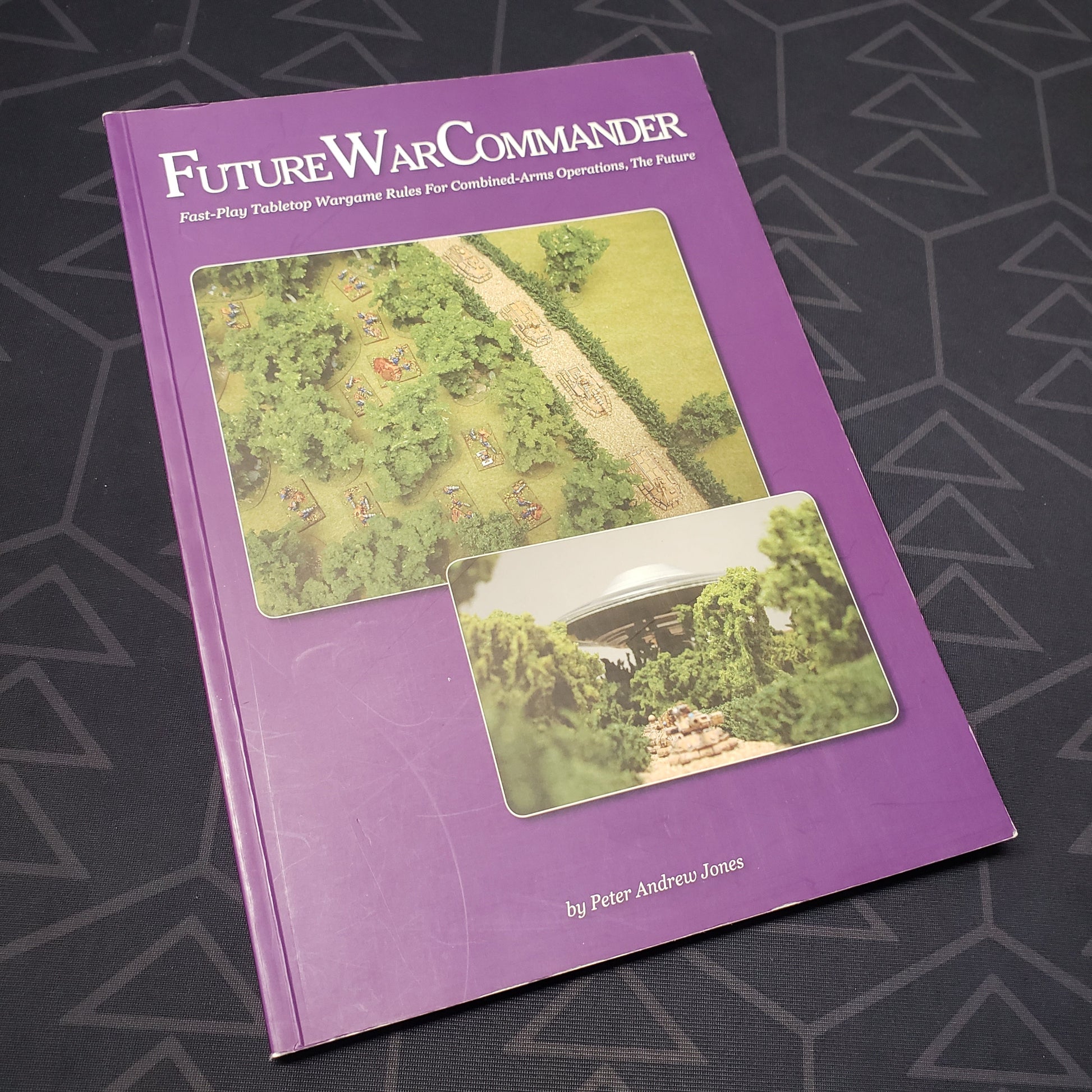 Image shows the front cover of the Future War Commander: First Edition Core Rules wargaming book