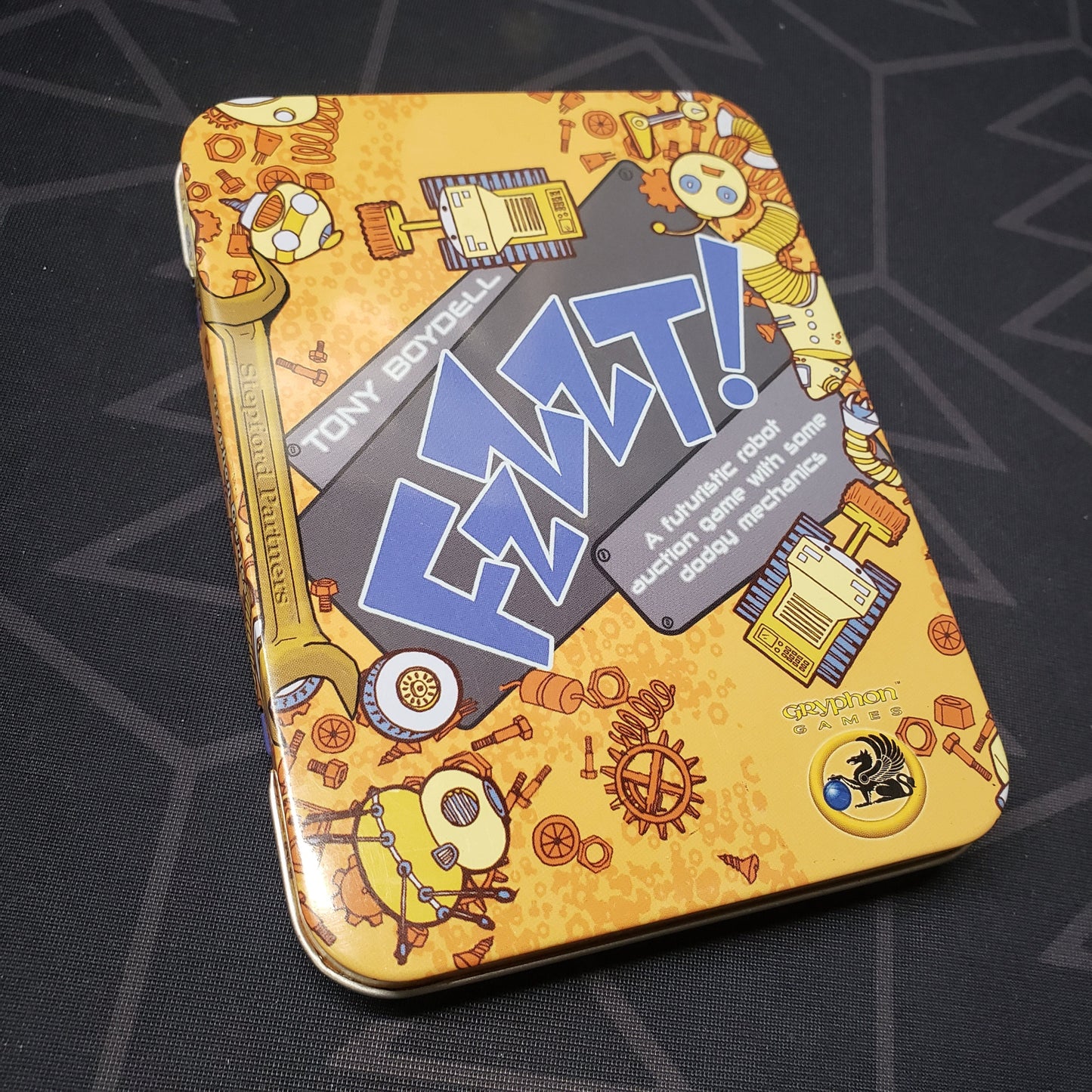 Image shows the front cover of the box for the Fzzzt! card game