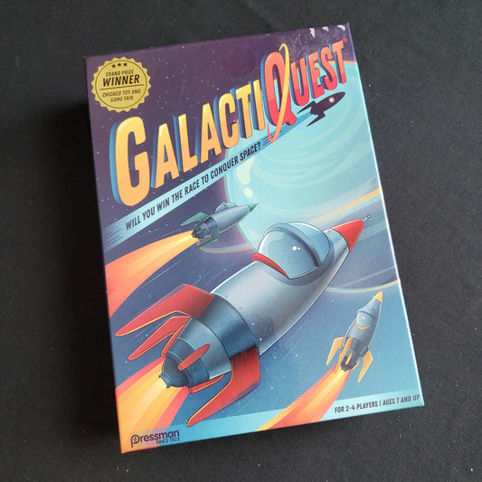 Image shows the front cover of the box of the Galactiquest board game