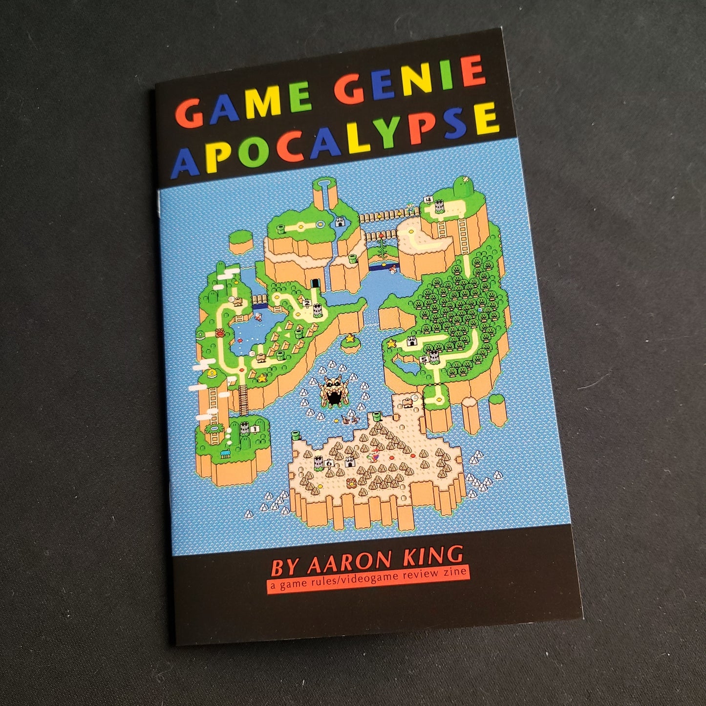 Image shows the front cover of the Game Genie Apocalypse roleplaying game book