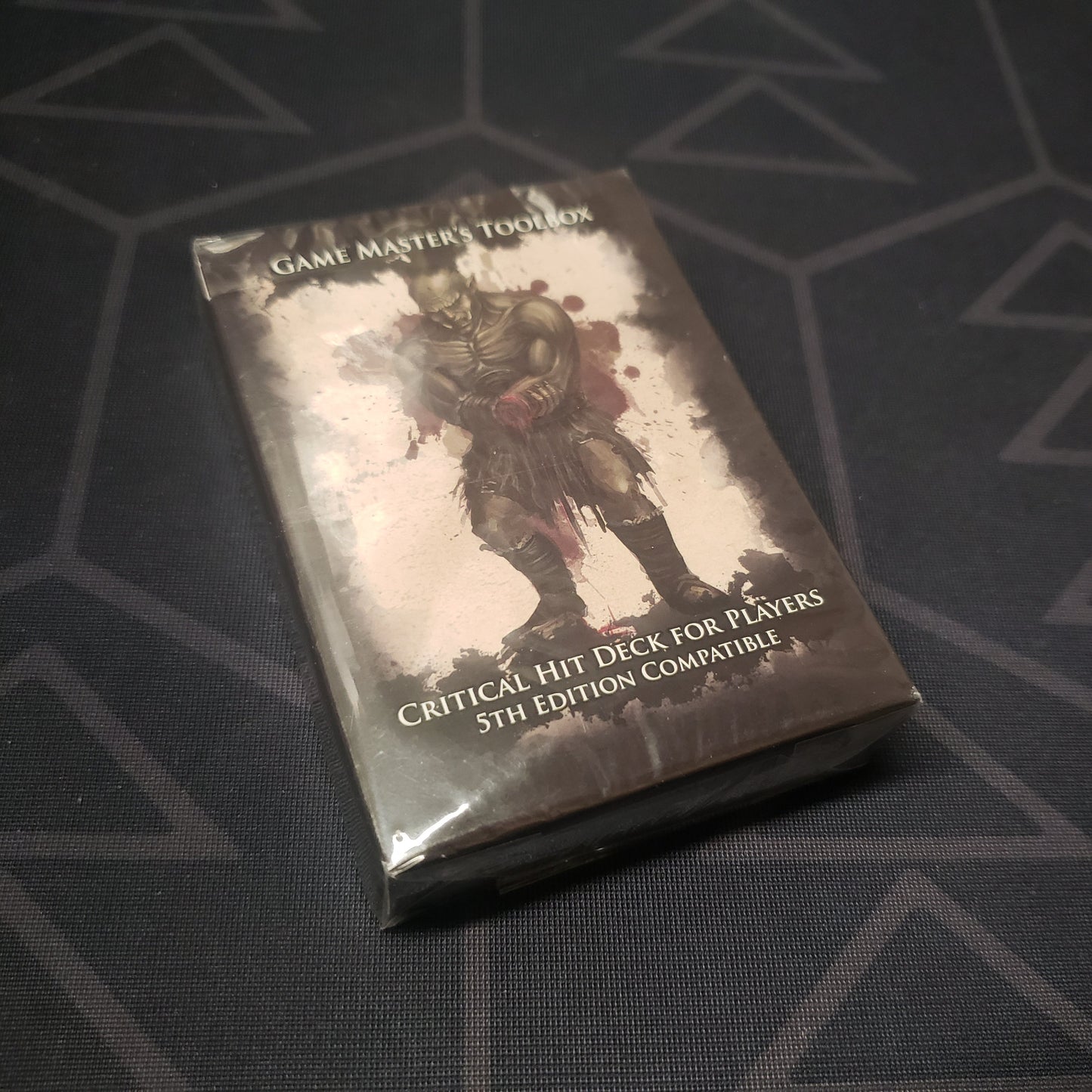 Image shows the front cover of the Game Master's Toolbox: Critical Hit Deck for Players box for the roleplaying game Dungeons & Dragons: Fifth Edition