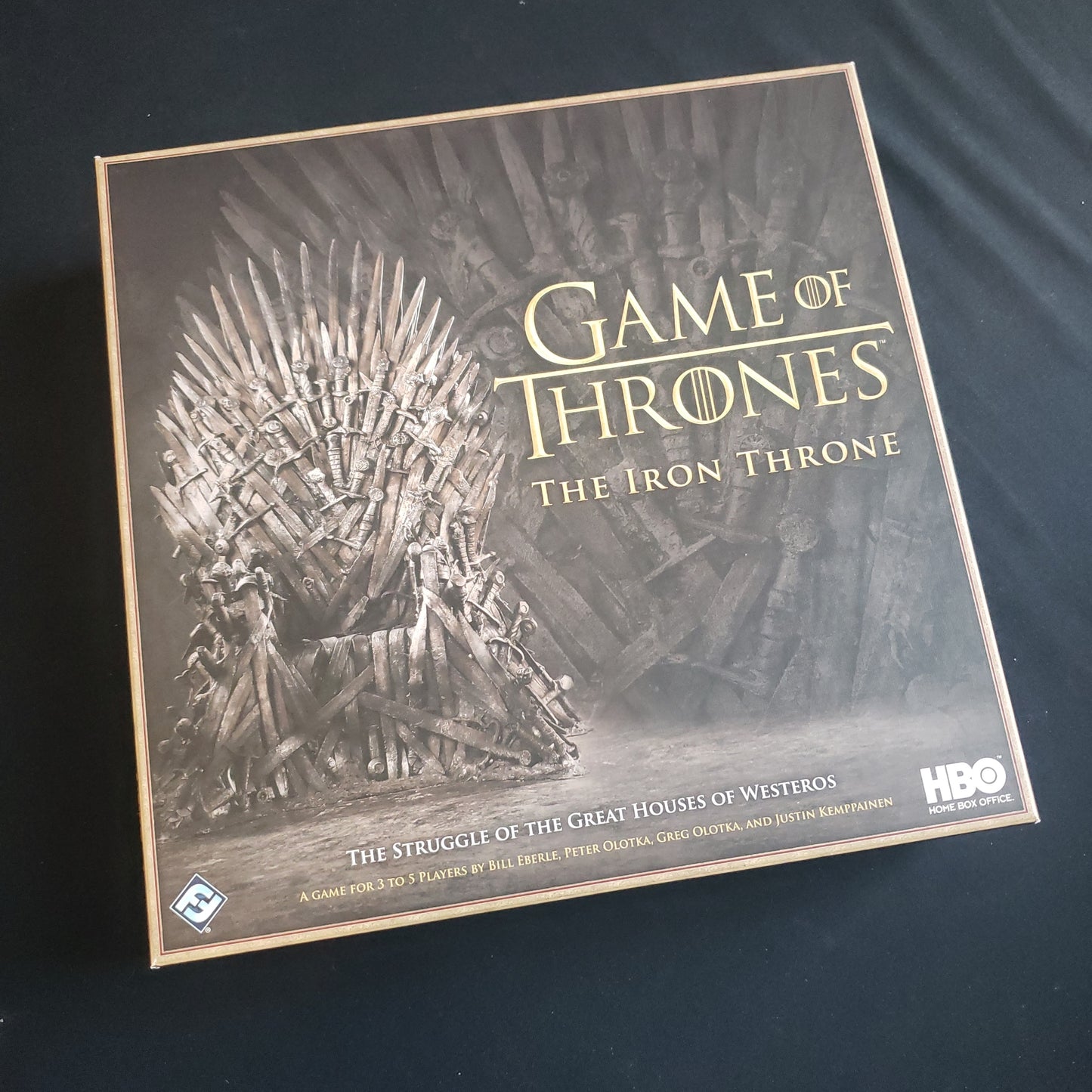 Image shows the front cover of the box of the Game of Thrones: The Iron Throne board game