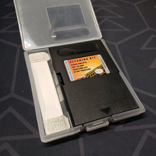 Image shows the front of the cartridge & brush for the official Gameboy Cleaning Kit for Nintendo Game Boy sitting in an open clear plastic case