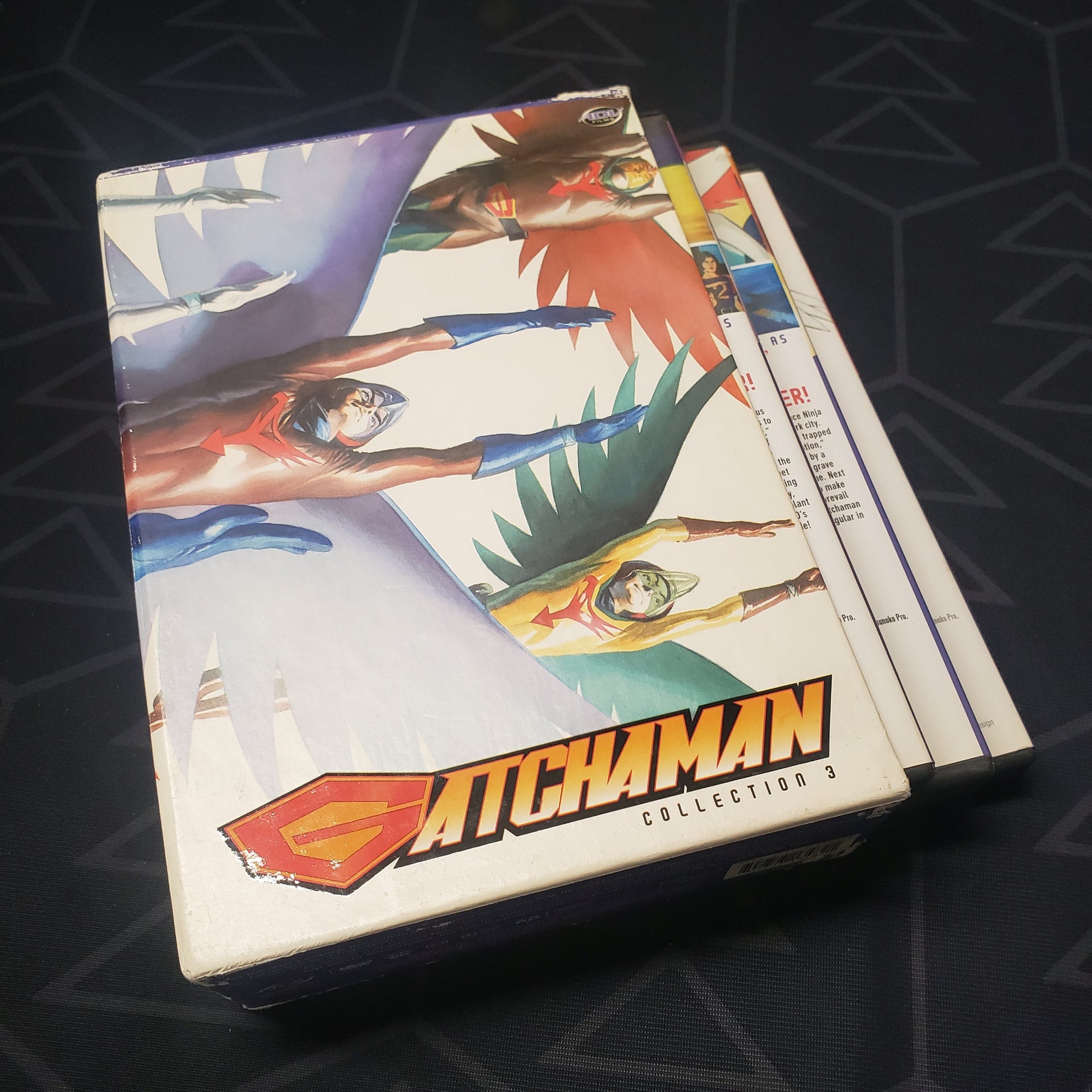 Image shows the case & three fanned-out disc cases for the Collection 3 box set of Gatchaman on DVD