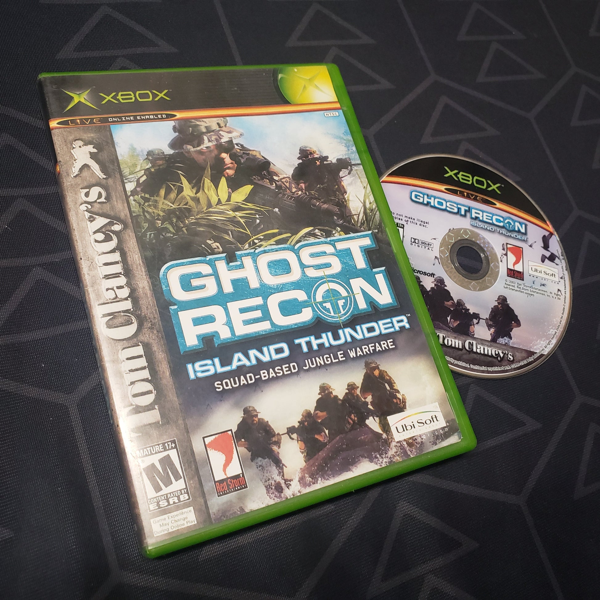 Image shows the case and disc for the video game Ghost Recon: Island Thunder for the original Xbox