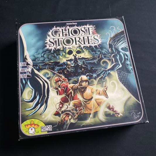 Image shows the front cover of the box of the Ghost Stories board game
