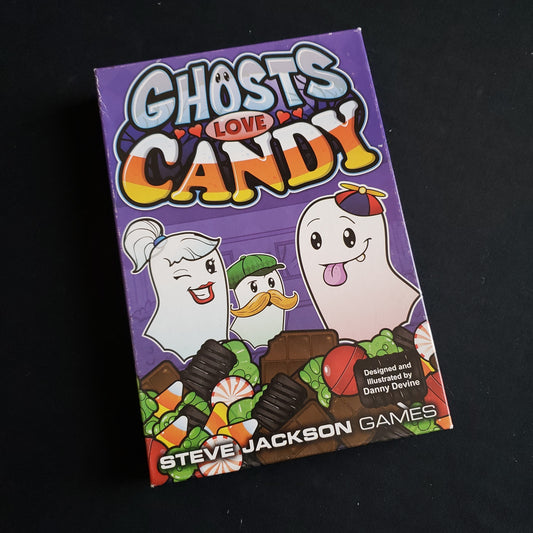 Image shows the front cover of the box of the Ghosts Love Candy card game
