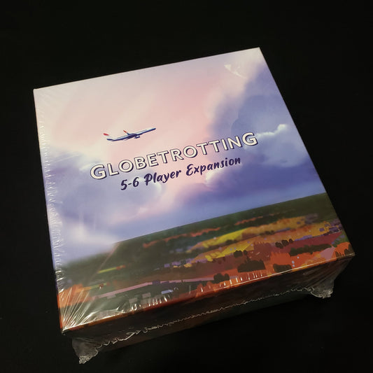 Image shows the front cover of the box of the 5-6 Player expansion for the board game Globtrotting