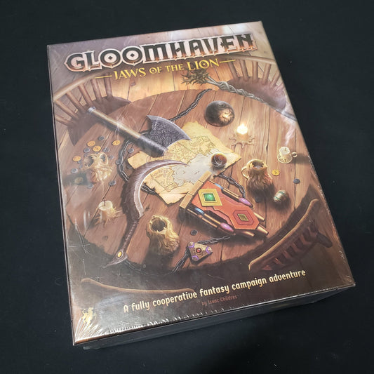 Image shows the front cover of the box of the Gloomhaven: Jaws of the Lion board game 